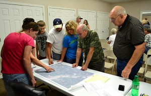 Peoplelookingatmap